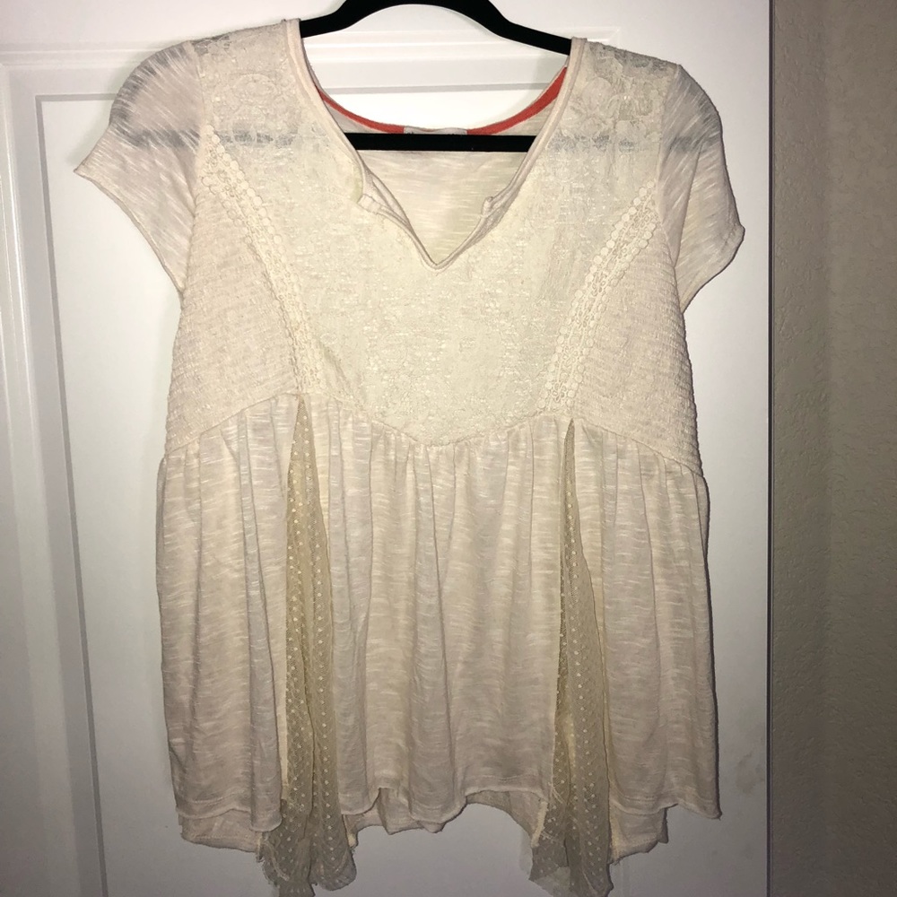 Lacy and flowy cream colored top
